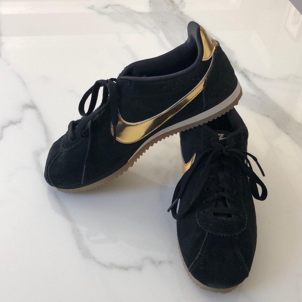 Nike black and metallic gold